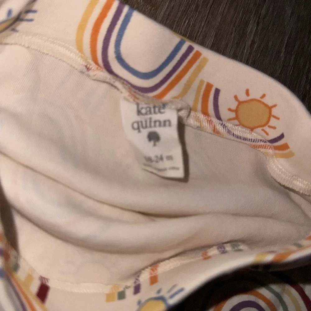 Kate Quinn rainbow and sunshine bummies